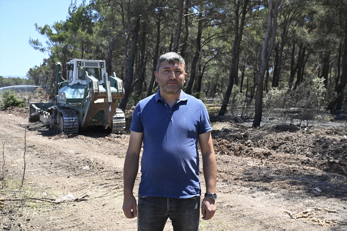 İş makinesi operatörleri yangına karşı ön safta alevlerle savaşıyor