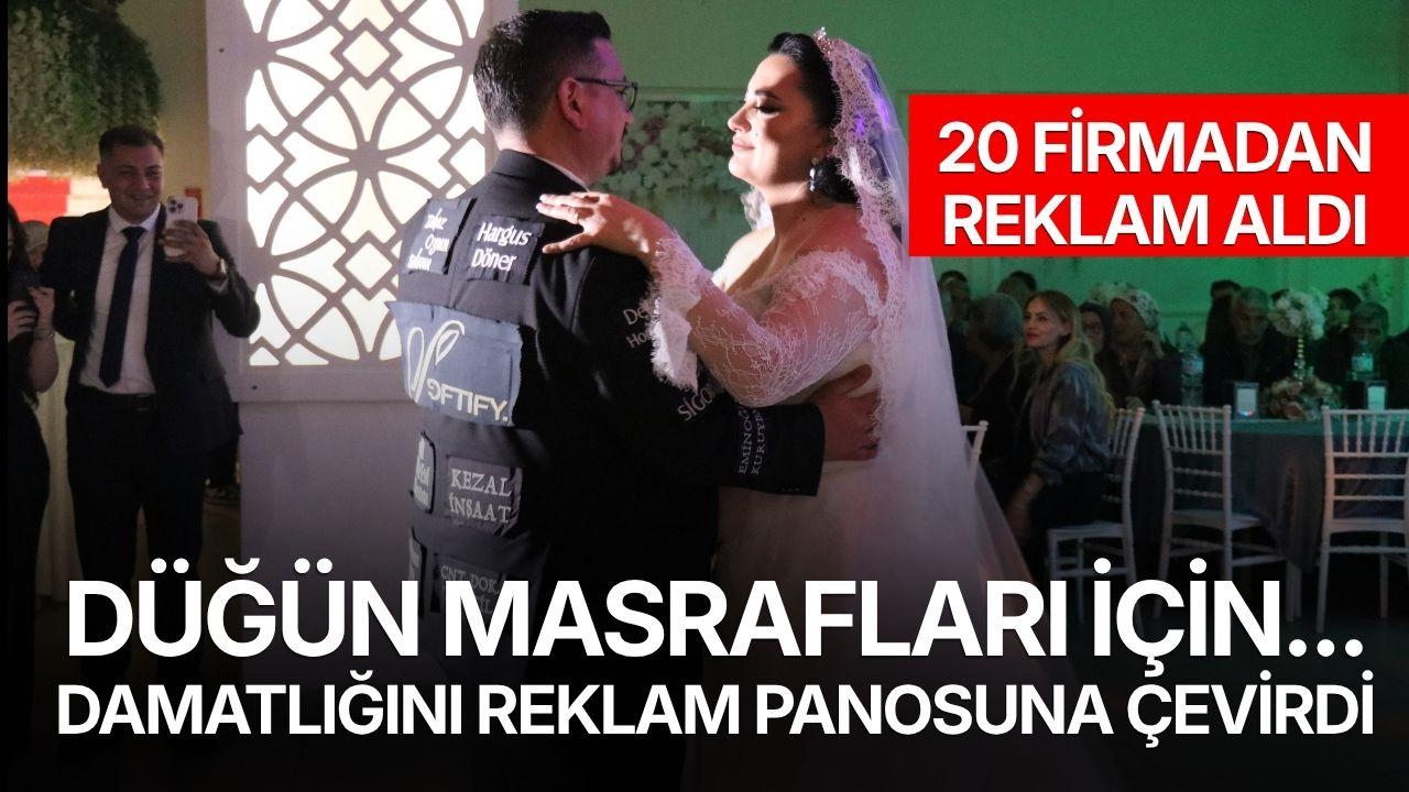 Düğün masrafları için damatlığını reklam panosuna çevirdi