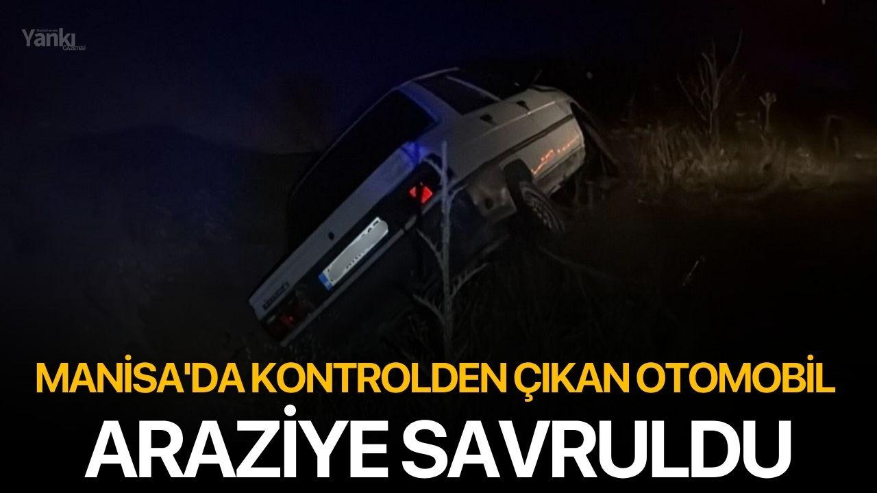 Manisa'da kontrolden çıkan otomobil araziye savruldu